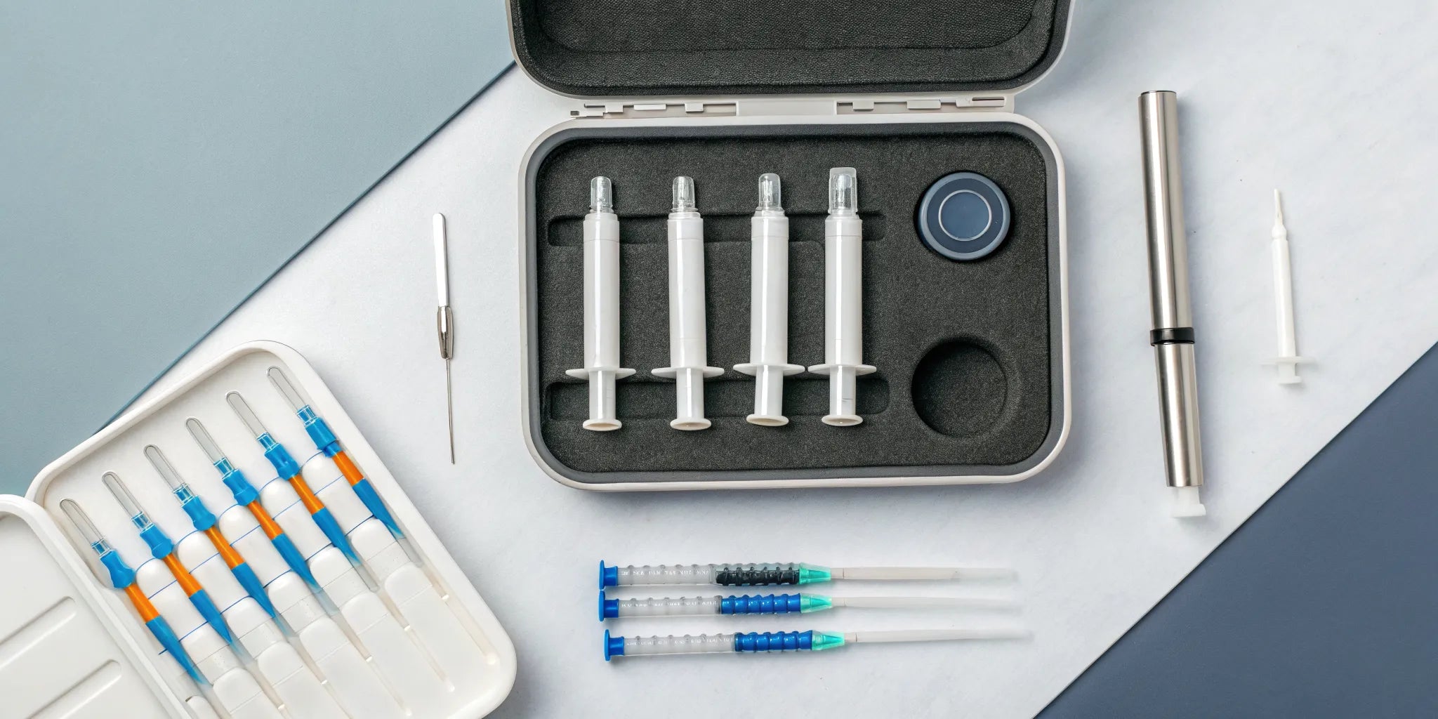 A complete dental composite resin kit with syringes and tools for restorative dentistry.
