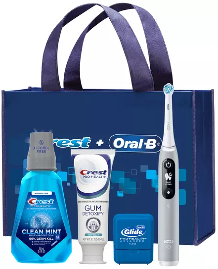 Procter & Gamble | Oral-B Io 6 Electric Rechargeable Toothbrush (Grey Handle); Crest Pro-Health Gum Detoxify Toothpaste (3.7 Oz); Multi-Protection Clean Mint Rinse (250 Ml); Oral-B Glide Pro-Health Advanced Floss (15 M); Io Clean Brush Head; Reusable Tote